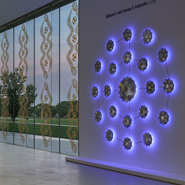 a grouping of backlit mirrors in a similar pattern to a soccer ball